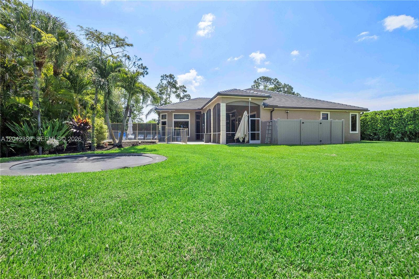 5755 NW 72nd Way, Parkland, FL 33067 Trampoline view