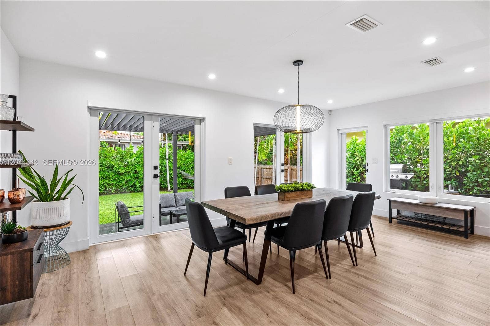 Table for 8 with French doors and natural light