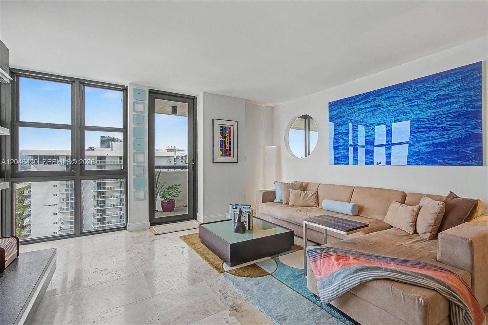 2555 Collins Avenue, #1814, Miami Beach, FL 33140 deep large living room with balcony impact door