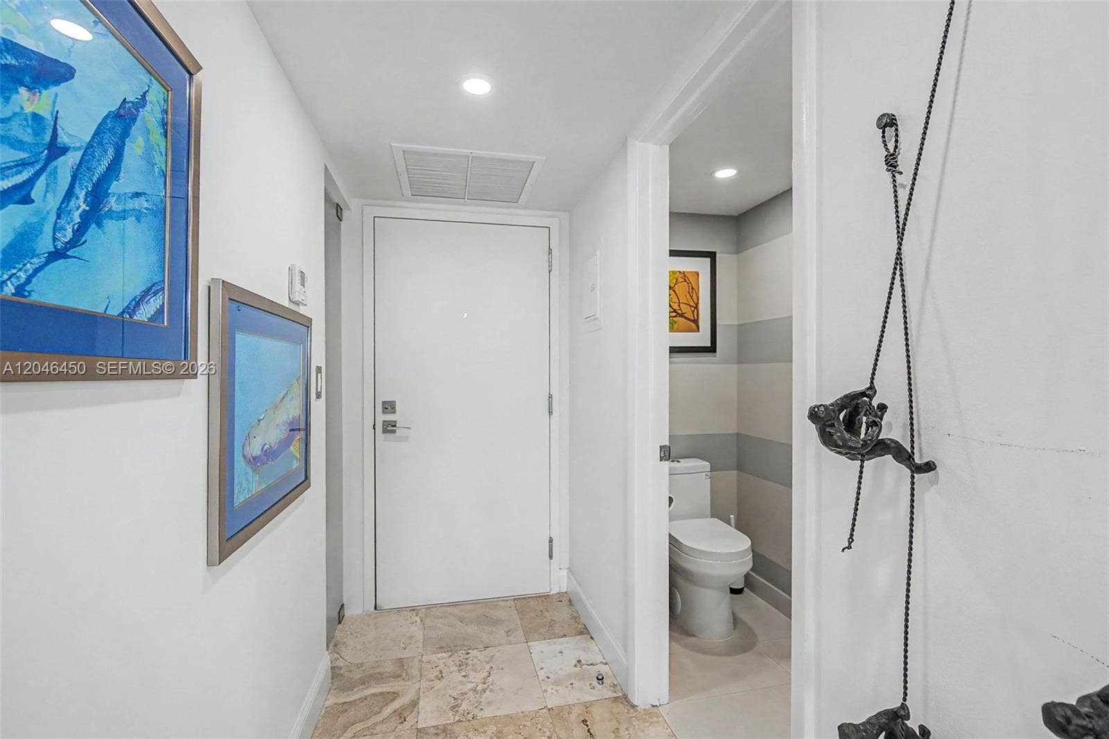 2555 Collins Avenue, #1814, Miami Beach, FL 33140 Entry foyer and powder room