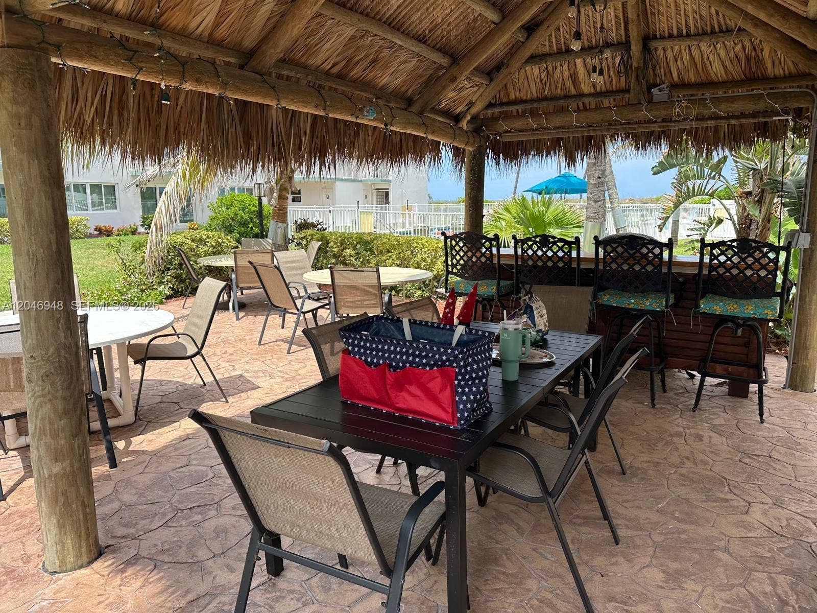 1750 S Ocean Boulevard, #304E, Lauderdale-By-The-Sea, Lauderdale By The Sea, FL 33062 Tiki area with tables