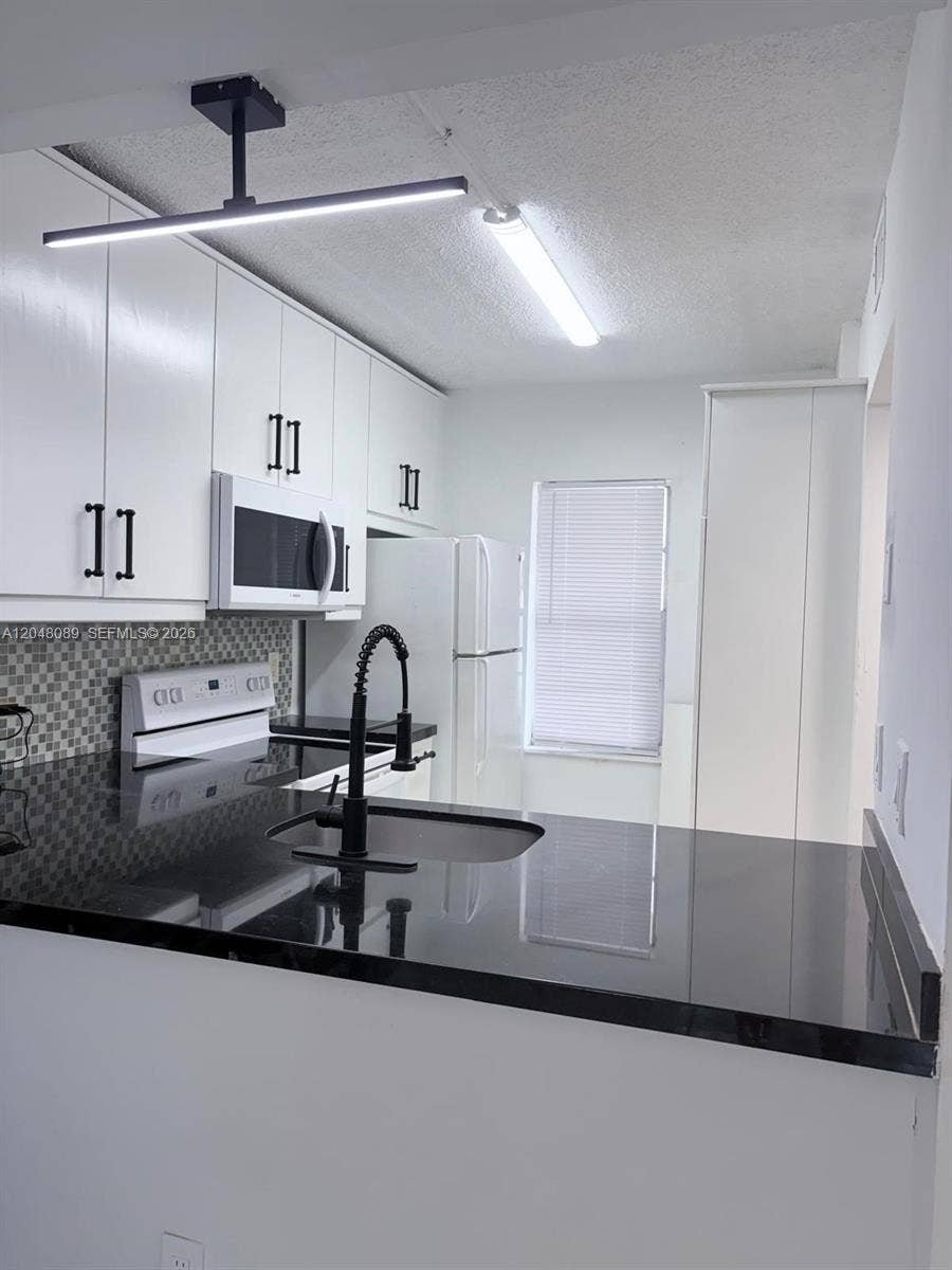 Property photo for 8305 Royal Palm Boulevard, #103, Coral Springs, FL