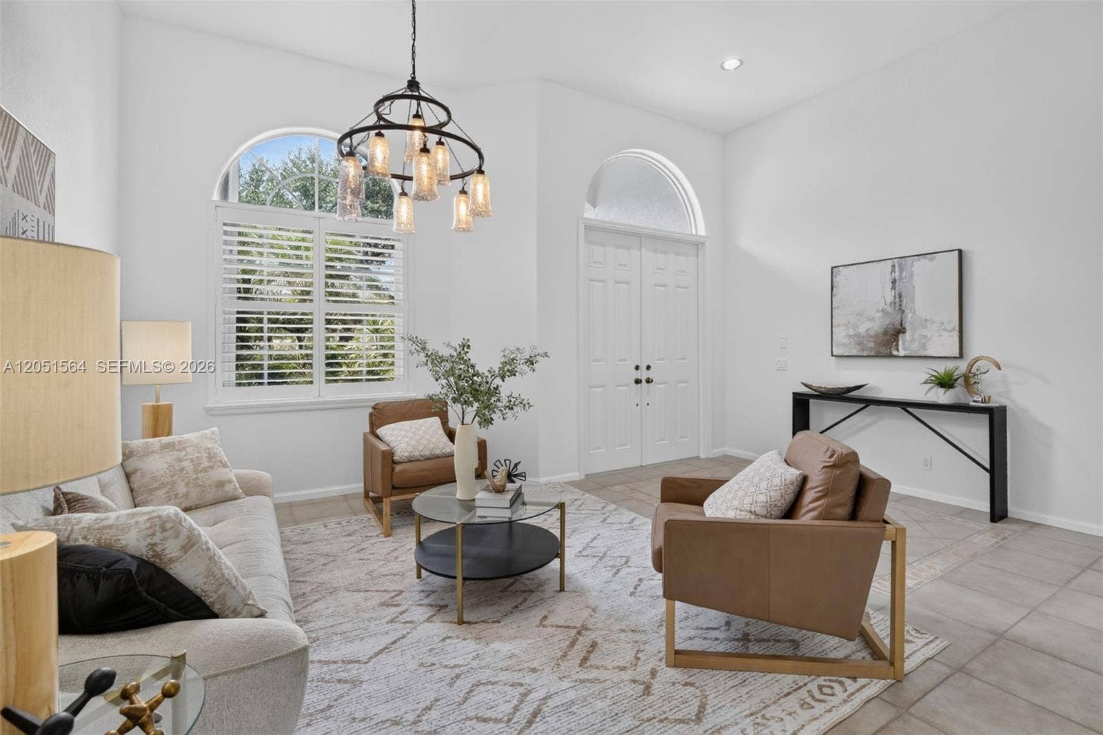 1164 Ginger Circle, Weston, FL 33326 Enter into the home and the views overlooking the pool and lake are so peaceful