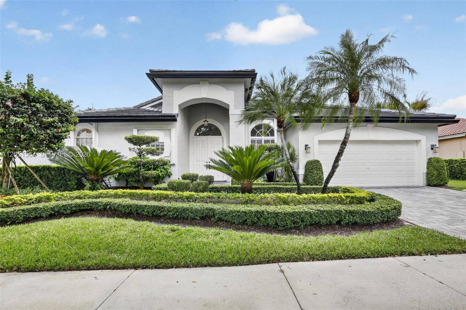 1164 Ginger Circle, Weston, FL 33326 Welcome home - beautiful curb appeal, paved driveway, 2024 Roof