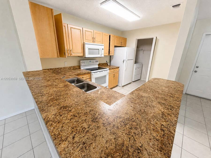 Property photo for 11211 W Atlantic Boulevard, #108, Coral Springs, FL