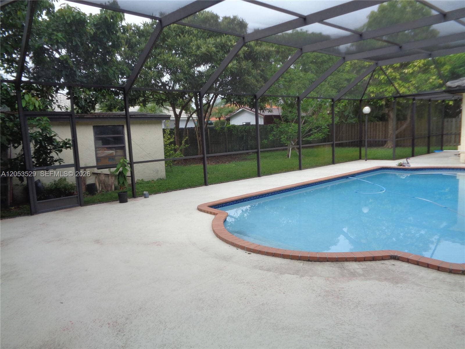 Tool Shed and Screened-In Patio