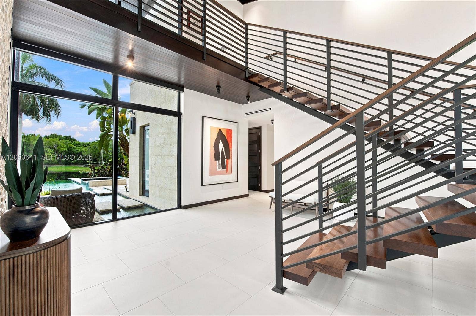 3714 Pine Lake Drive, Weston, FL 33332 Wood and iron staircase