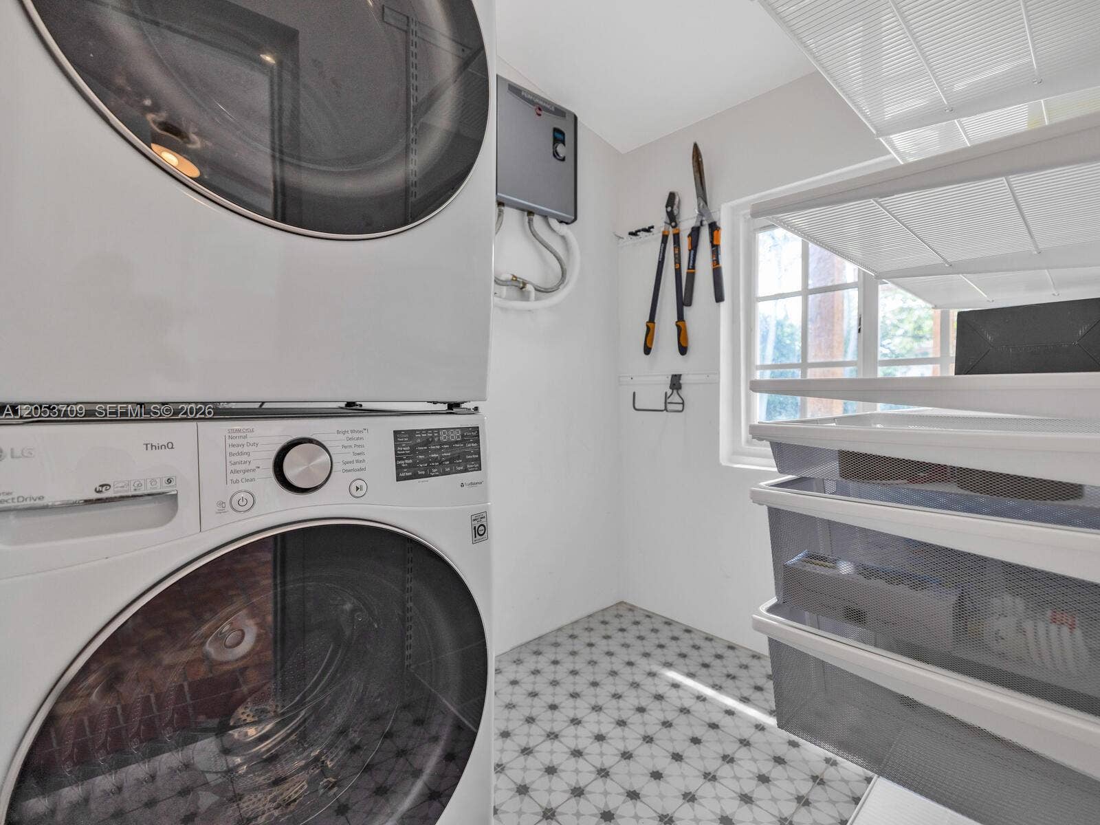 9033 Carlyle Avenue, Surfside, FL 33154 Laundry Room with Storage