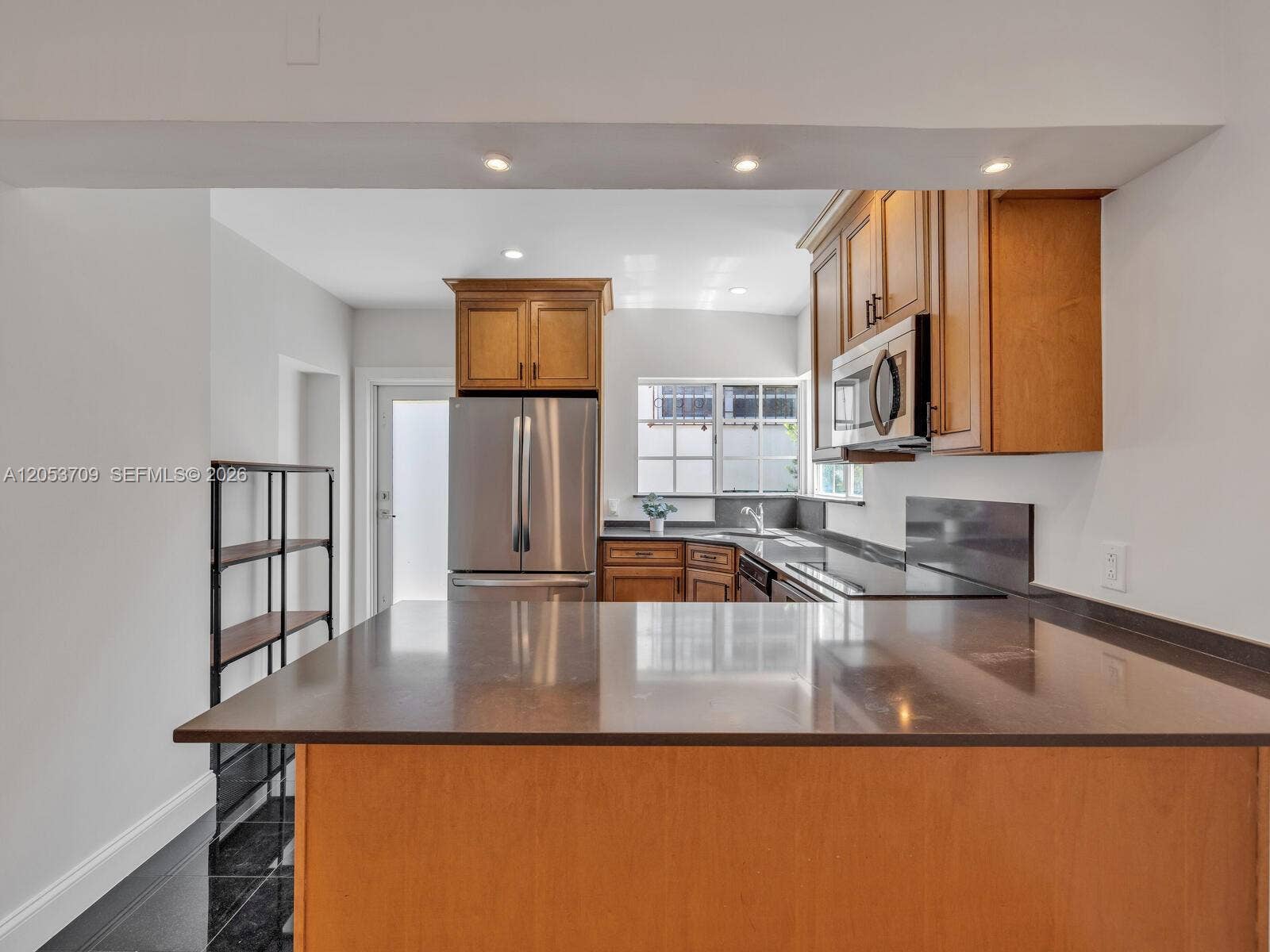 9033 Carlyle Avenue, Surfside, FL 33154 Kitchen with Breakfast Bar