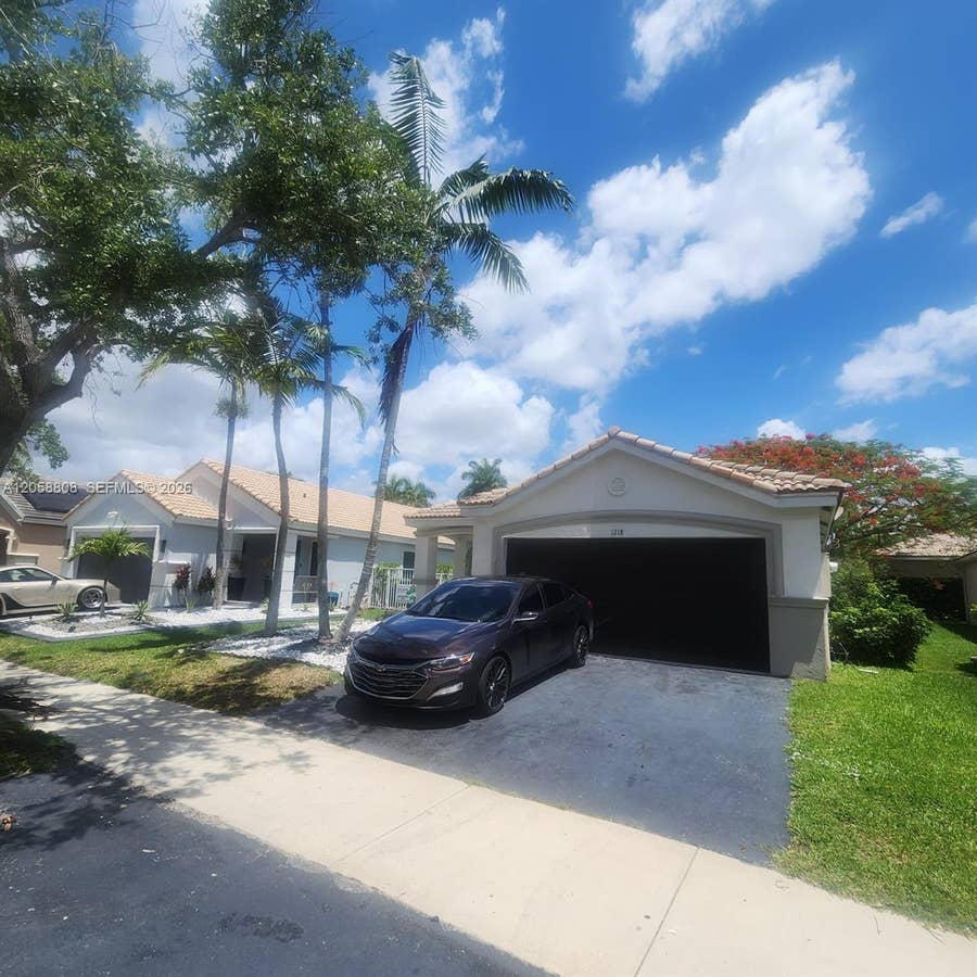 Property photo for 1218 Canary Island Drive, Weston, FL