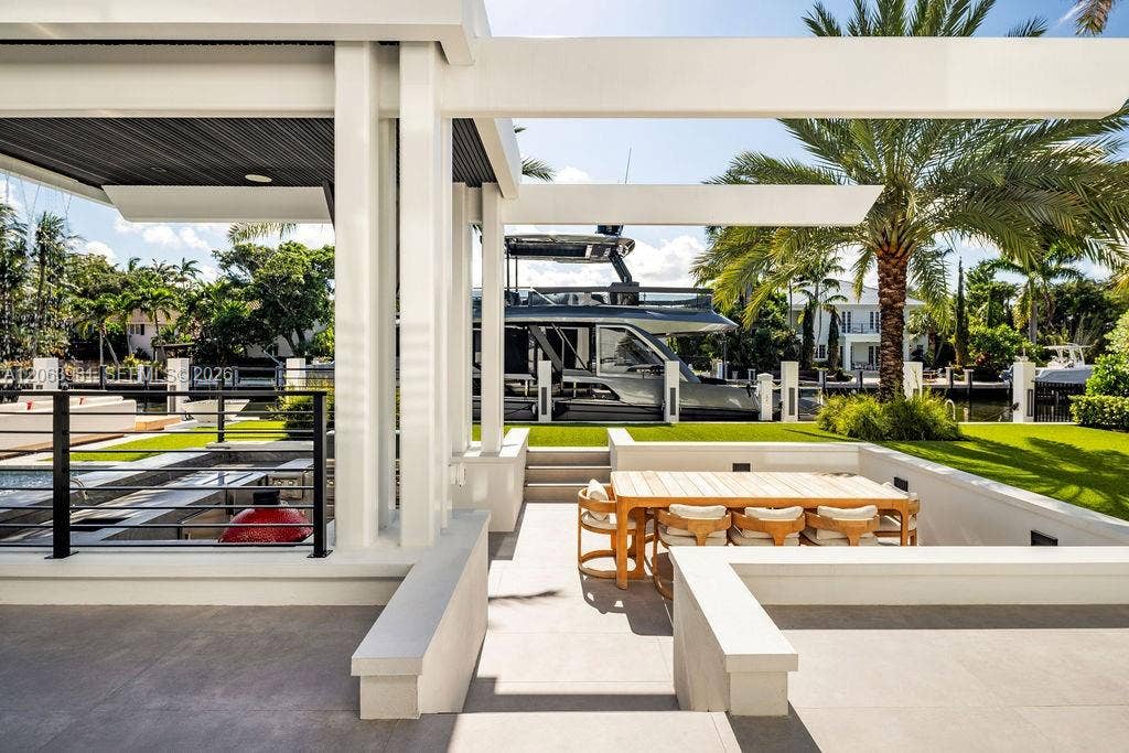 725 Poinciana Drive, Fort Lauderdale, FL 33301 Your own resort: a gazebo, a waterfall, and a swim-up bar.