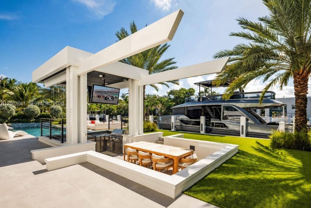 725 Poinciana Drive, Fort Lauderdale, FL 33301 Your own resort: a gazebo, a waterfall, and a swim-up bar.