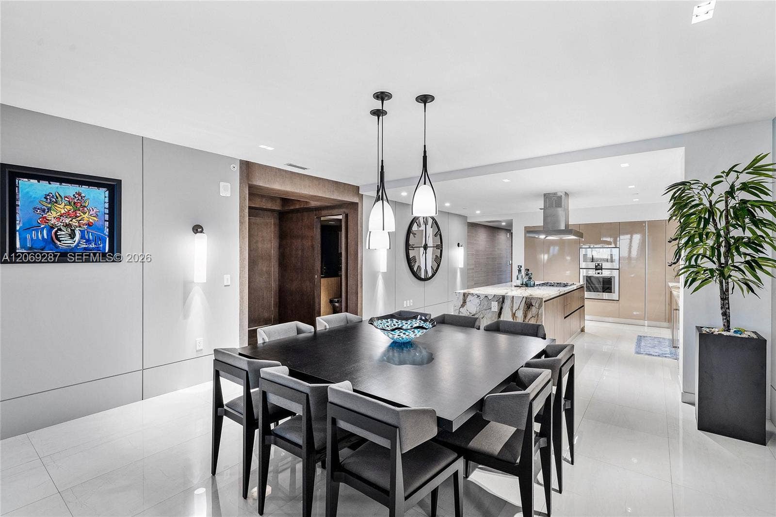 435 Bayshore Drive, #703, Fort Lauderdale, FL 33304 An elegant dining area and a seamless flow to the kitchen.
