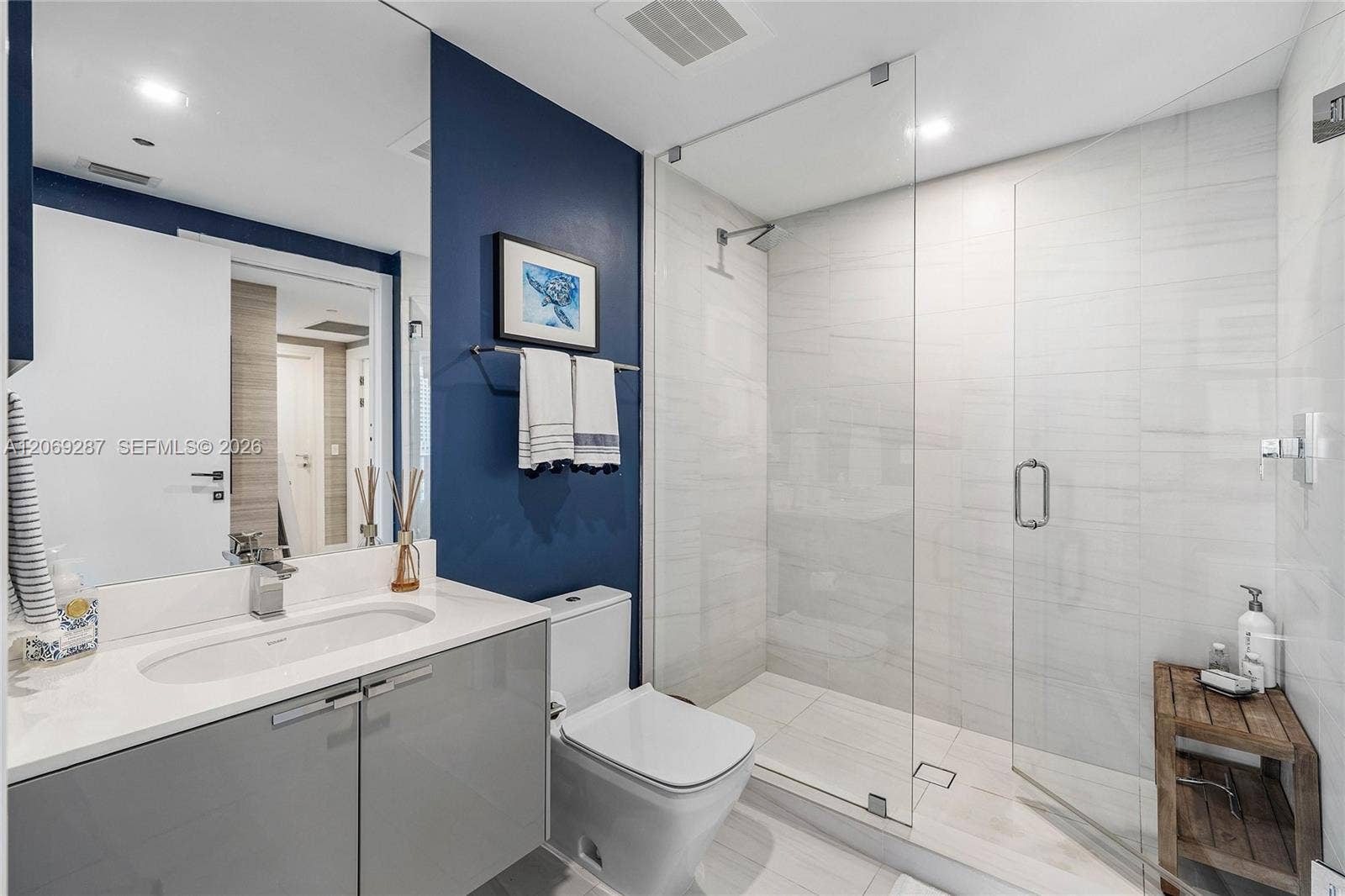435 Bayshore Drive, #703, Fort Lauderdale, FL 33304 A beautifully appointed second bedroom with a private en-suite bathroom