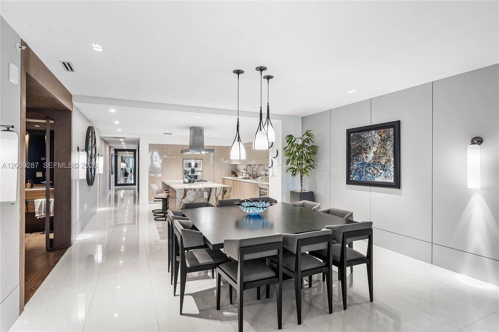 435 Bayshore Drive, #703, Fort Lauderdale, FL 33304 A refined dining area offering a sophisticated setting for intimate dinners and effortless entertaining.