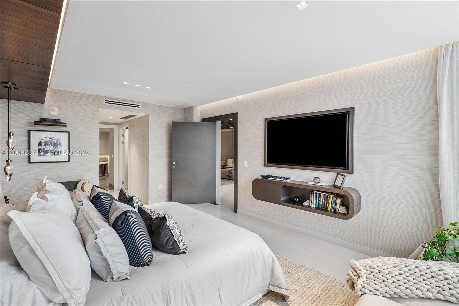 435 Bayshore Drive, #703, Fort Lauderdale, FL 33304 The primary suite is privately positioned at the opposite end of the residence, separate from the additional bedrooms.