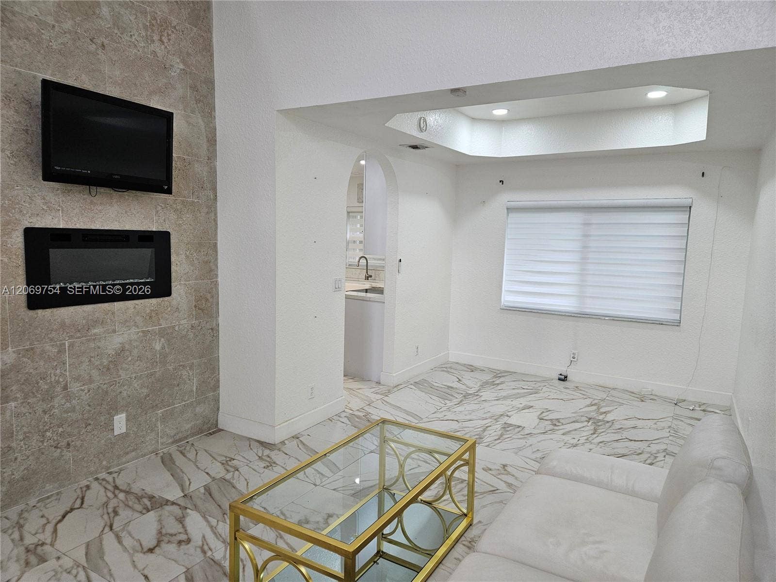 387 NW 107th Avenue, Pembroke Pines, FL 33026 Primary living area with fireplace