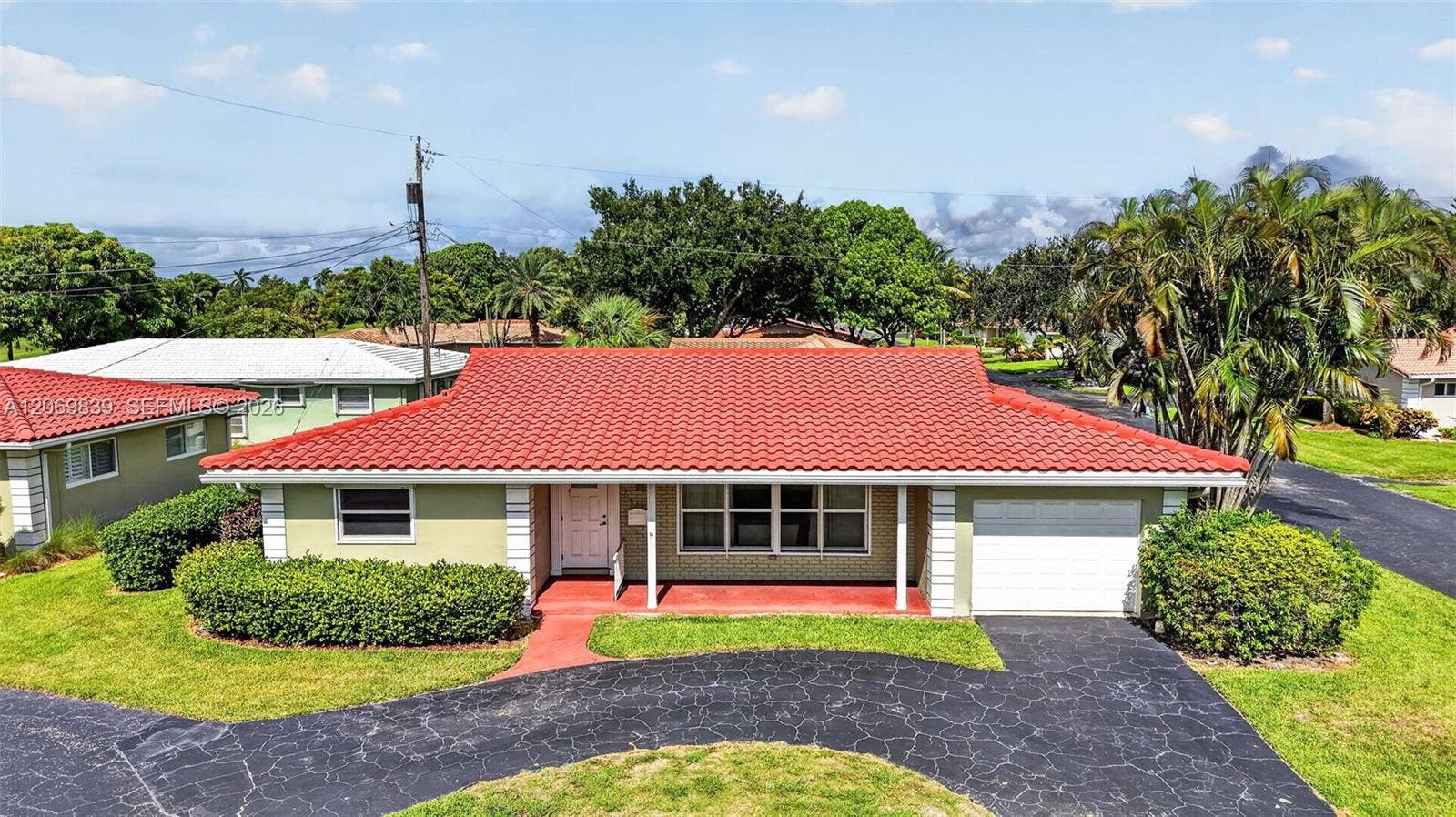 7118 E Tropical Way, Plantation, FL 33317 Photo 1