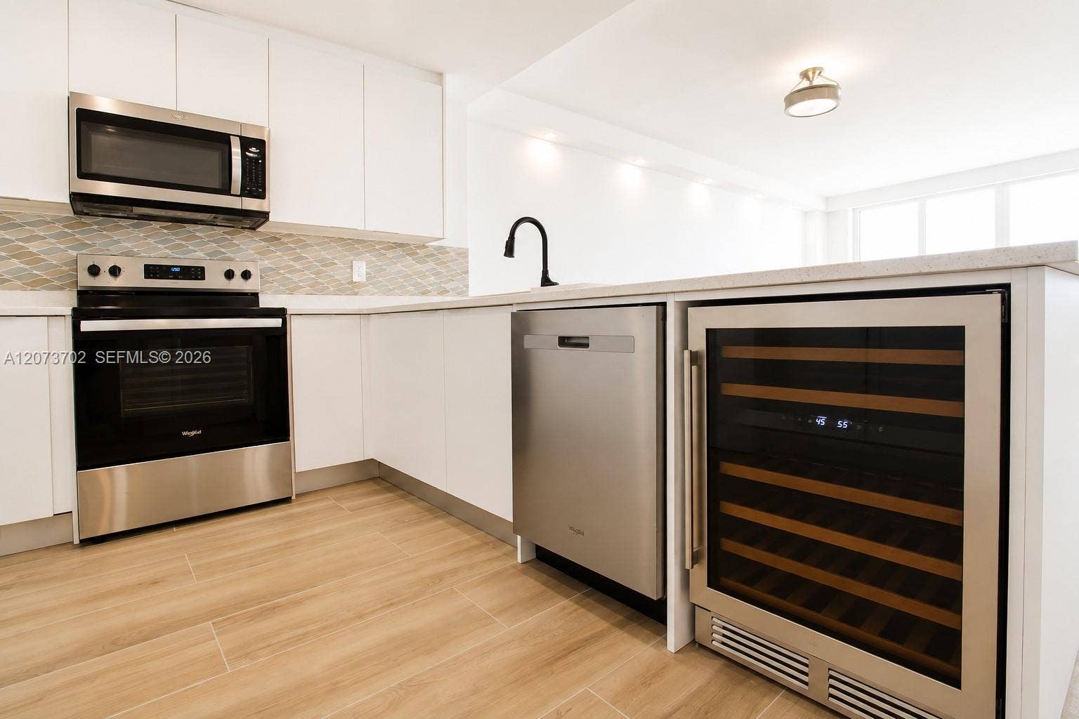5601 Collins Avenue, #1009, Miami Beach, FL 33140 Full with Wine Fridge