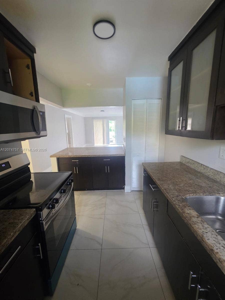 4121 Stirling Road, #207, Dania, Dania Beach, FL 33314 Photo 1