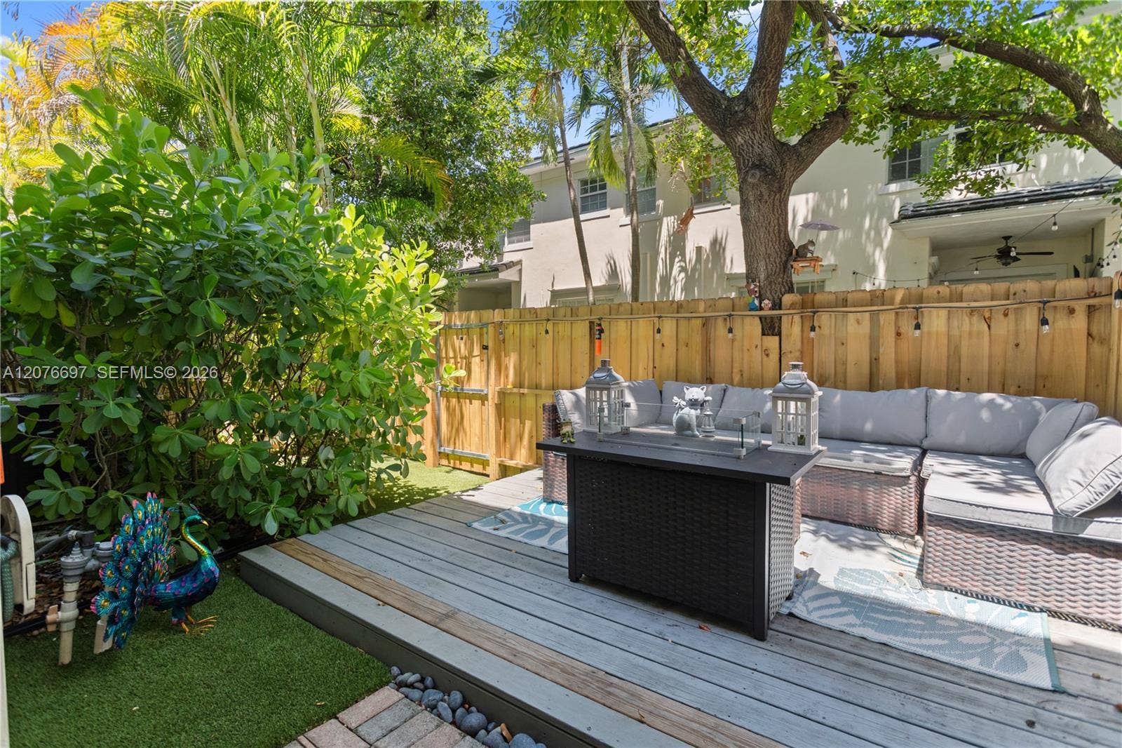 1139 N Victoria Park Road, Fort Lauderdale, FL 33304 Private back yard retreat with artificial turf and brand new fence in 2025.