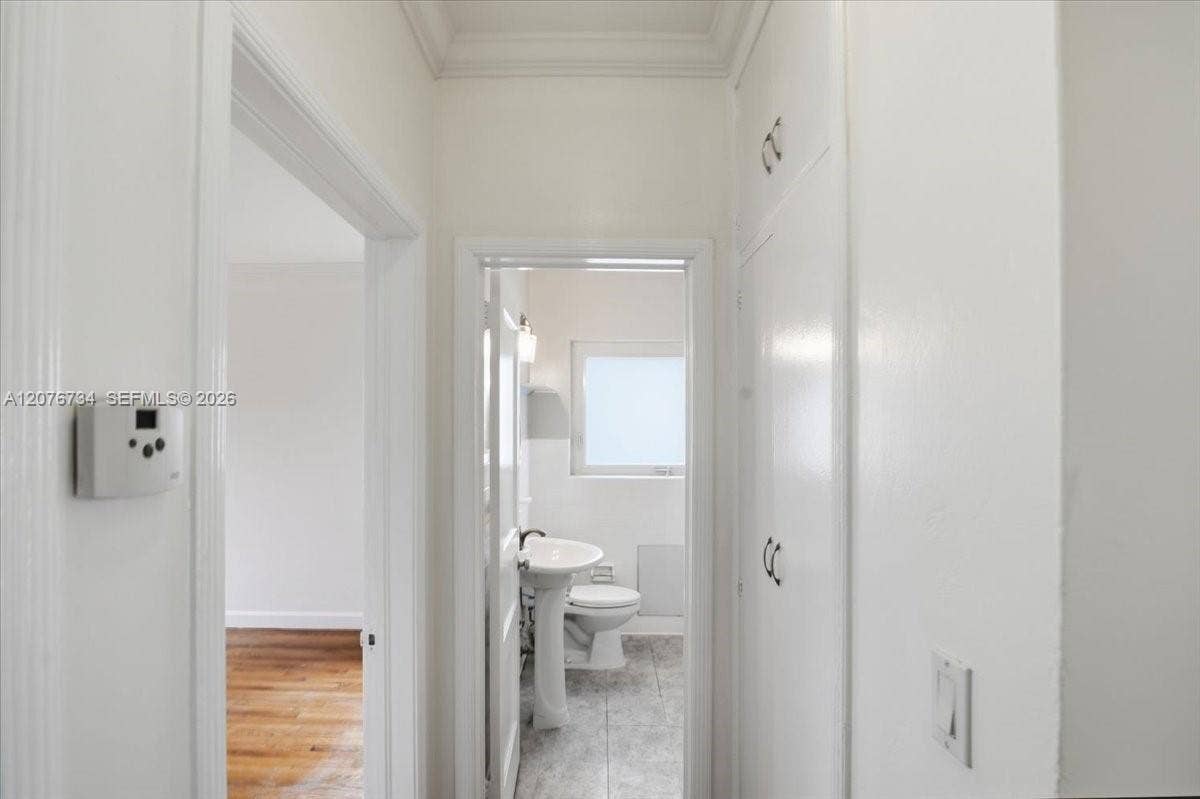 Hallway to bathroom #1 and bedroom #2