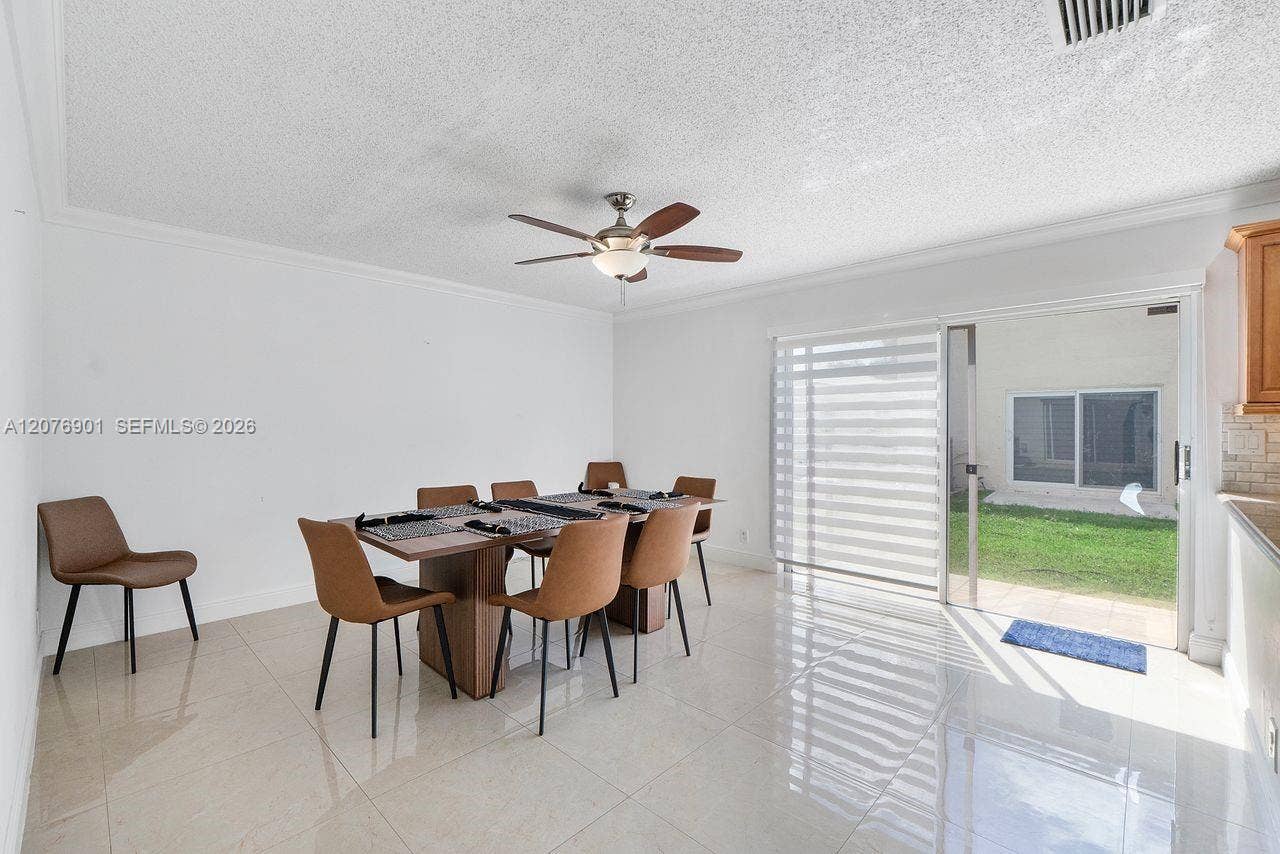 9602 NW 8th Circle, Plantation, FL 33324 Dining 1_ Opened floor plan with the kitchen