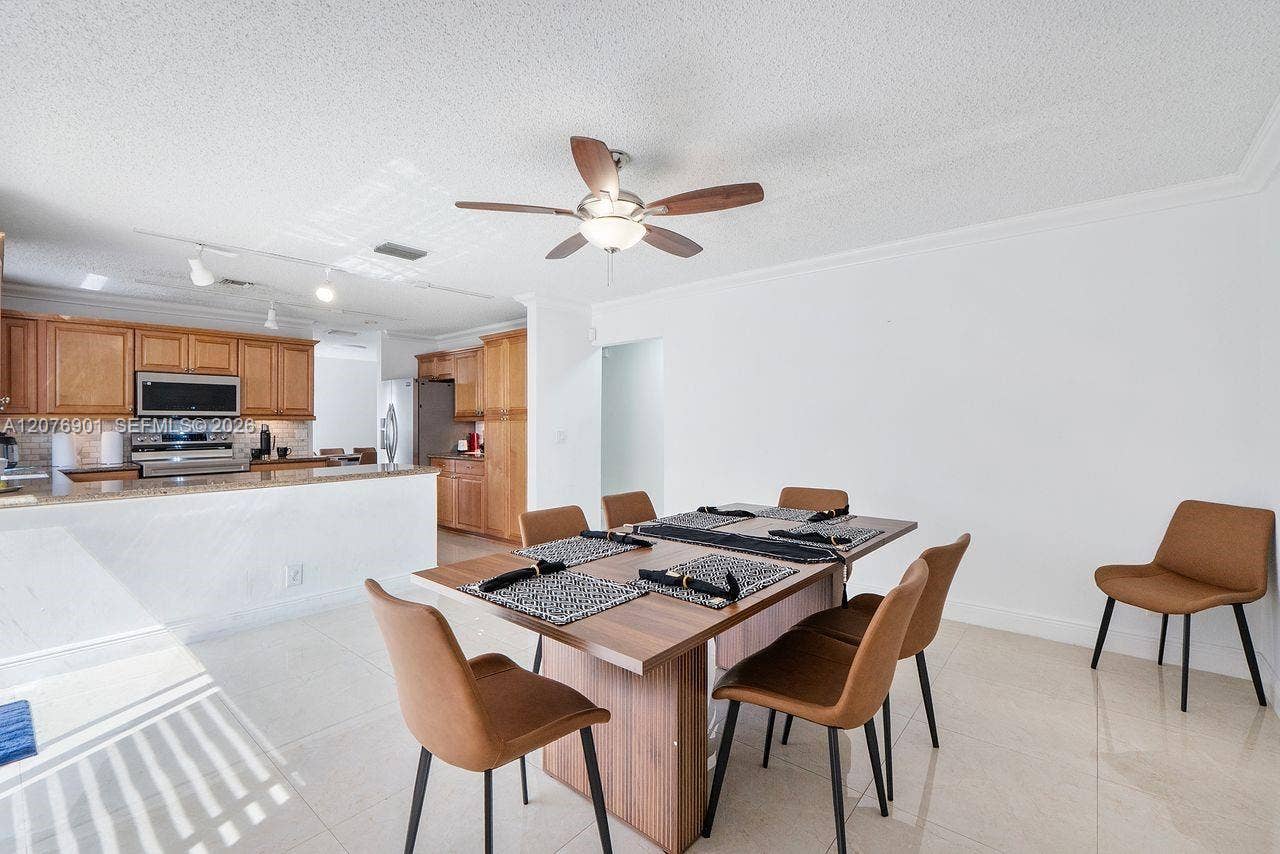9602 NW 8th Circle, Plantation, FL 33324 Dining 1_ Opened floor plan with the kitchen