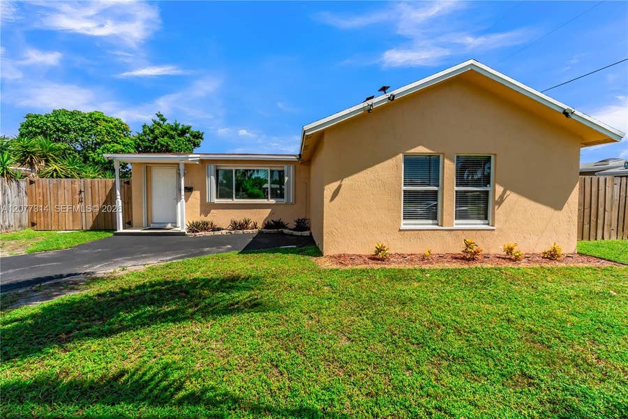 Property photo for 841 NE 59th Street, Oakland Park, FL