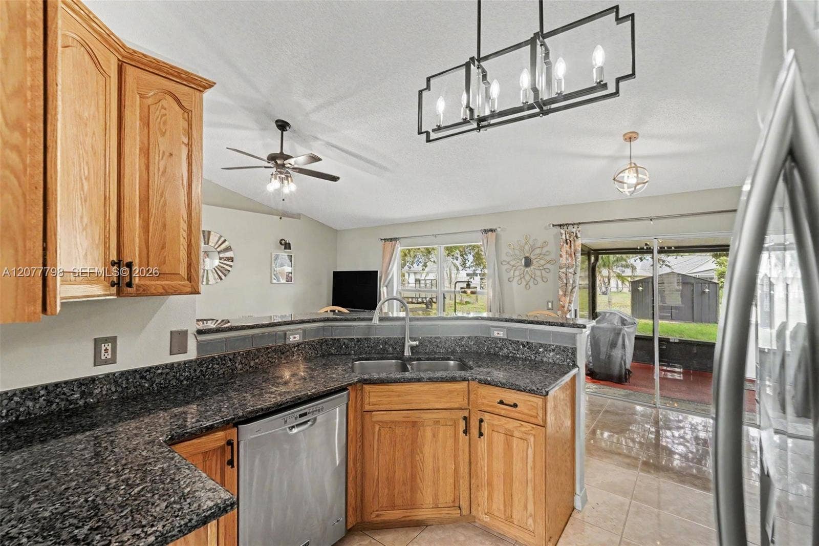 534 Davidson Street SE, Palm Bay, FL 32909 Kitchen looking toward enclosed patio