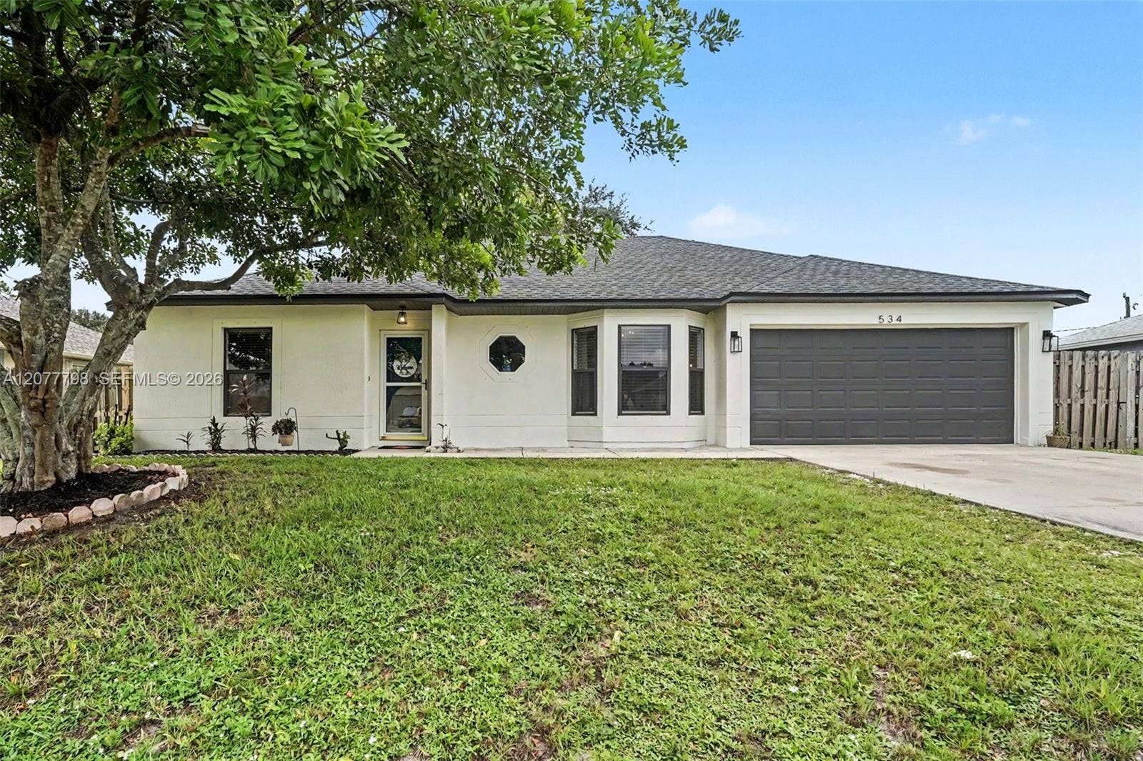 534 Davidson Street SE, Palm Bay, FL 32909 Front of house from street.