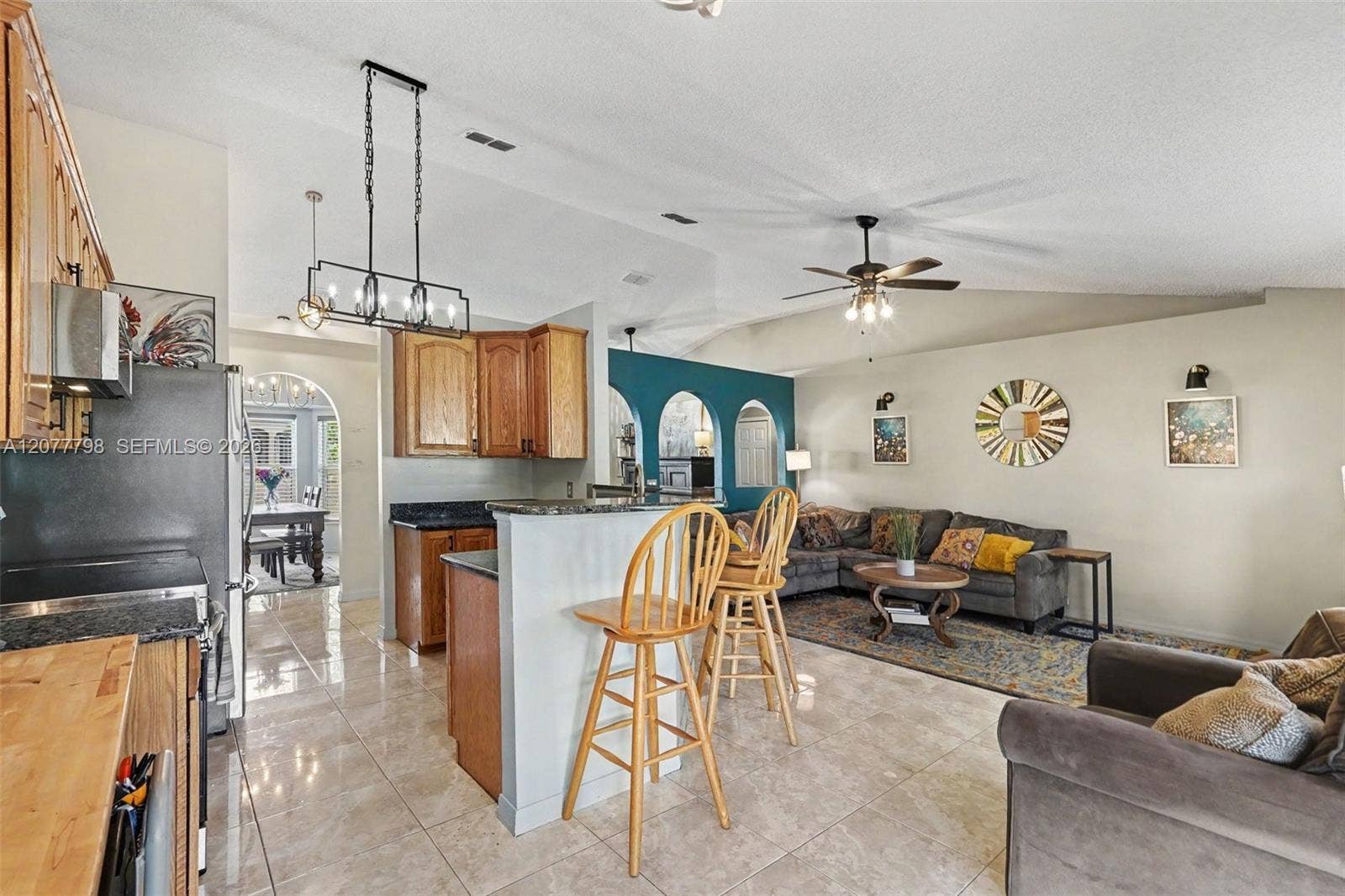 534 Davidson Street SE, Palm Bay, FL 32909 View of kitchen and family room