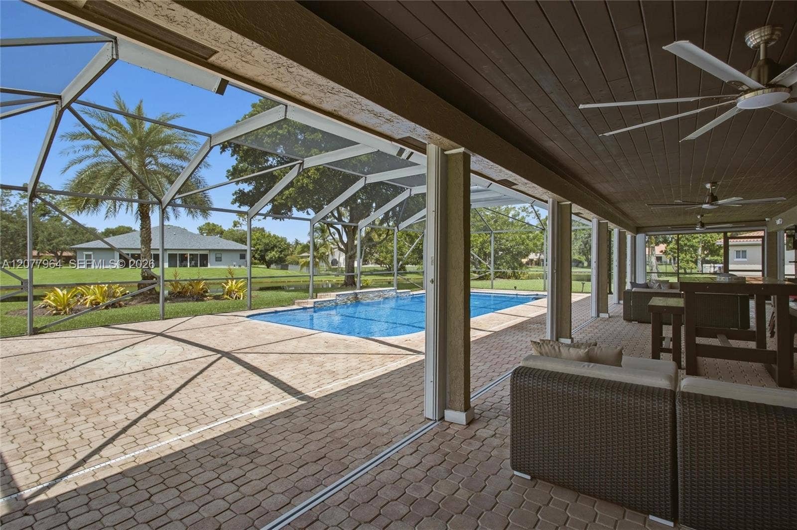 3151 SW 133rd Terrace, Davie, FL 33330 COVERED PATIO W/ HURRICANE PROTECTION
