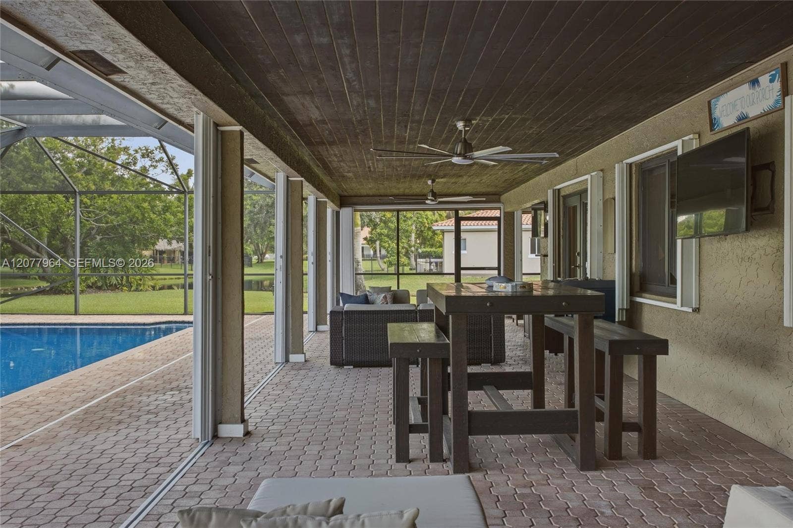 3151 SW 133rd Terrace, Davie, FL 33330 COVERED PATIO W/ HURRICANE PROTECTION