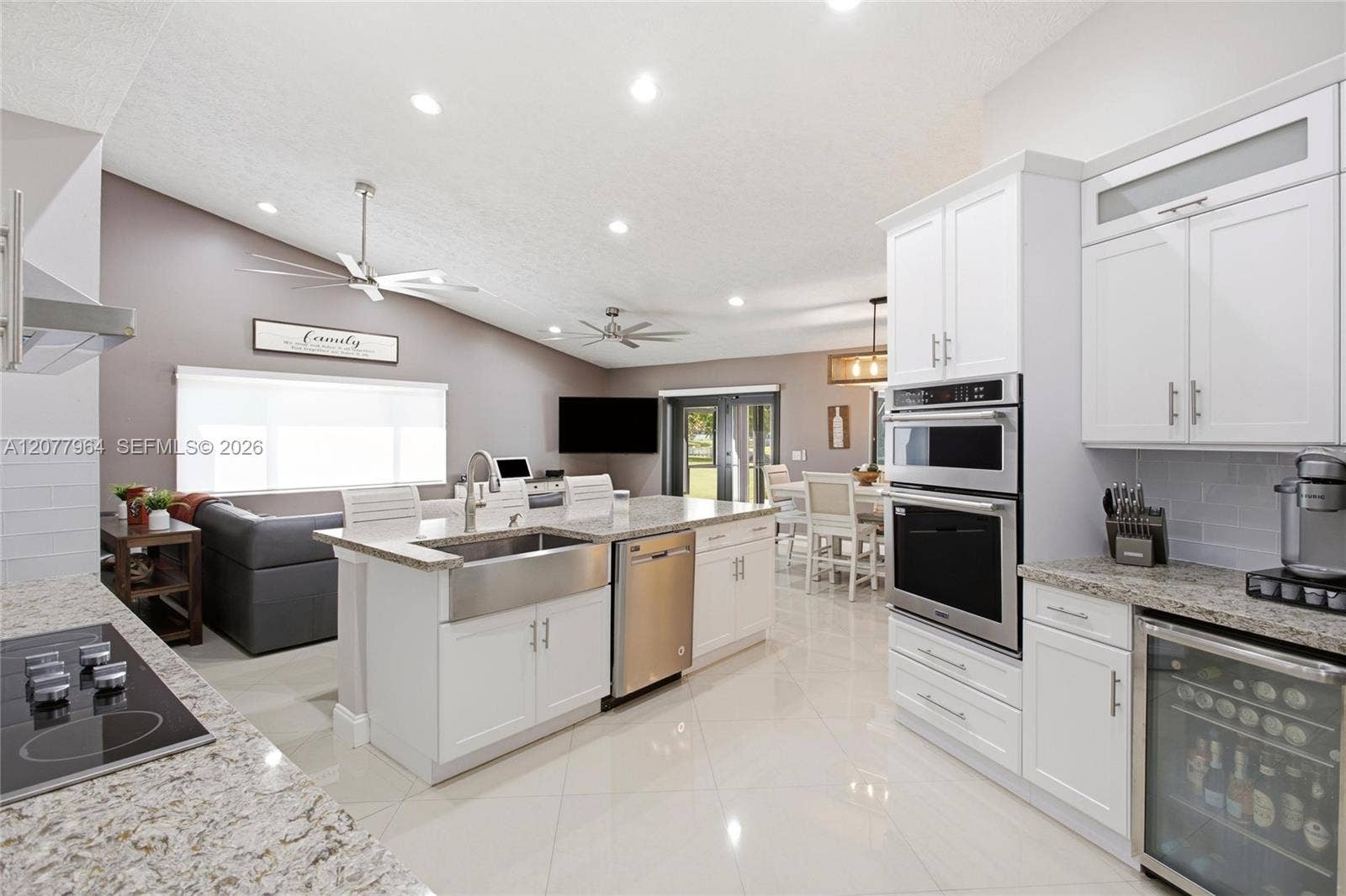 3151 SW 133rd Terrace, Davie, FL 33330 RENOVATED KITCHEN FACING FAMILY ROOM