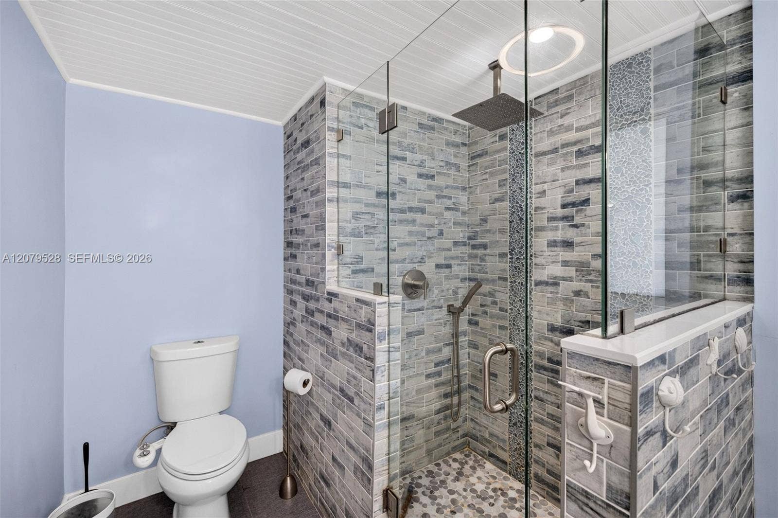 2518 Tortugas Lane, Fort Lauderdale, FL 33312 Primary Bathroom, glass shower door and tiled, dual vanity, lovely update