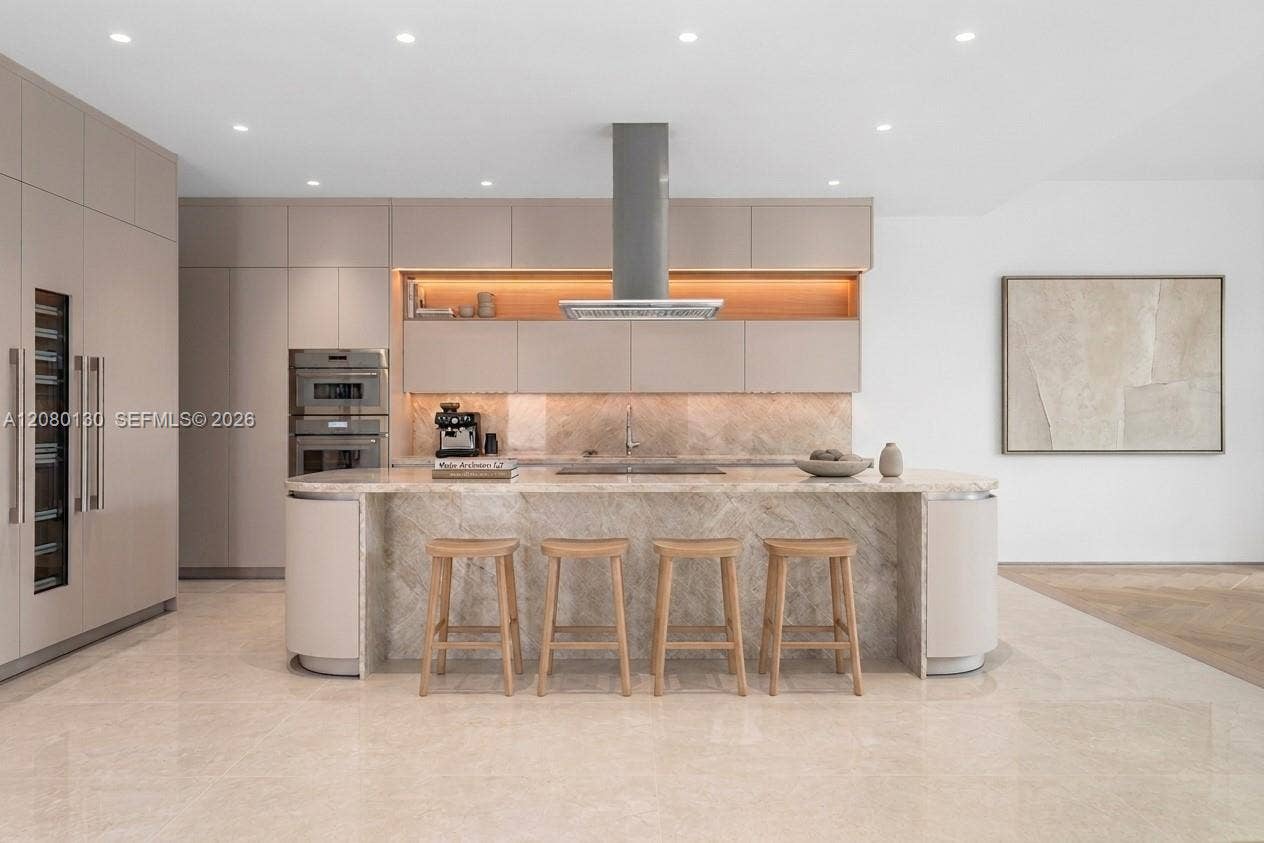 Kitchen. Disclaimer: Several photographs presented in this listing contain digitally added furniture, artwork, and decor. These virtually staged images are intended solely for illustrative purposes.