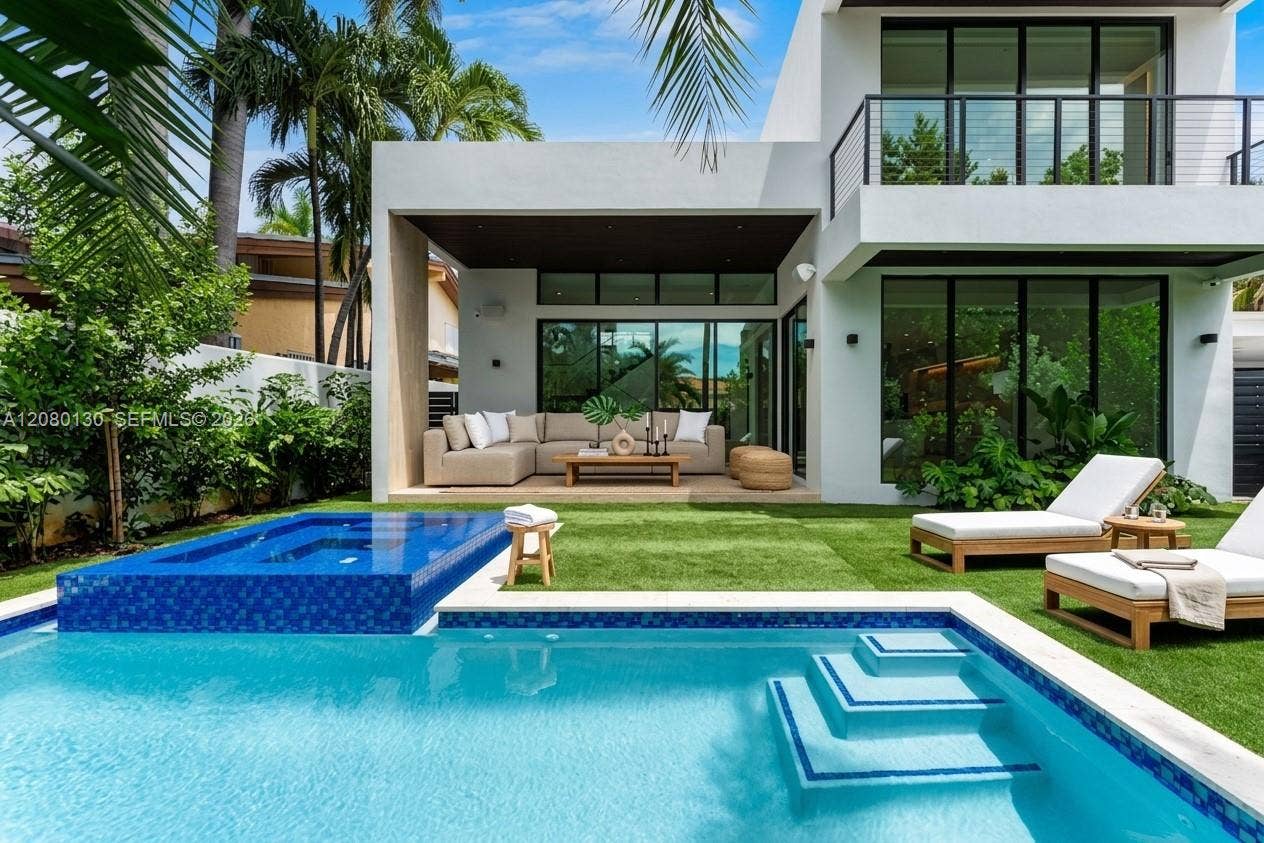 Back Yard. Disclaimer: Several photographs presented in this listing contain digitally added furniture, artwork, and decor. These virtually staged images are intended solely for illustrative purposes.