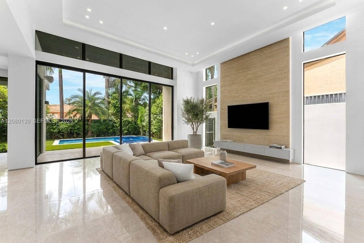 Living Room. Disclaimer: Several photographs presented in this listing contain digitally added furniture, artwork, and decor. These virtually staged images are intended solely for illustrative purposes.