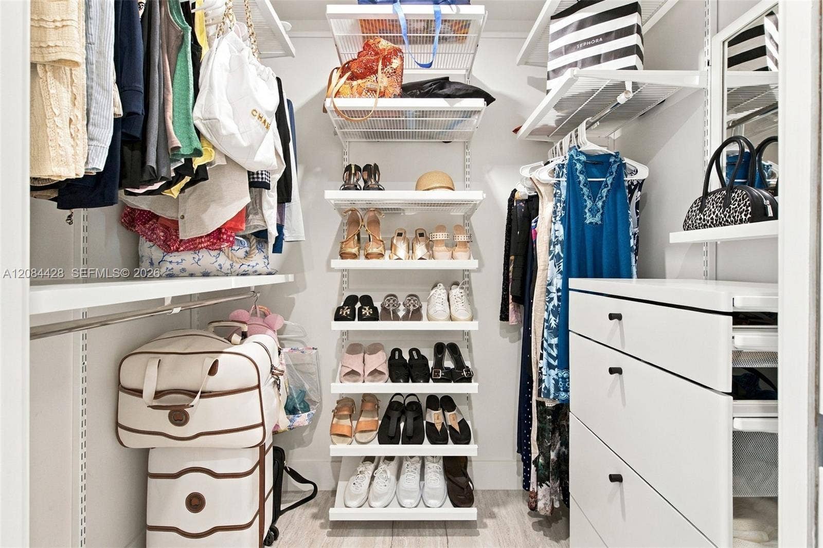 730 N Ocean Boulevard, #601, Pompano Beach, Pompano Beach, FL 33062 Second custom-fitted walk-in closet with extensive shelving, drawers and shoe storage. Closets will be cleared for tenant use.