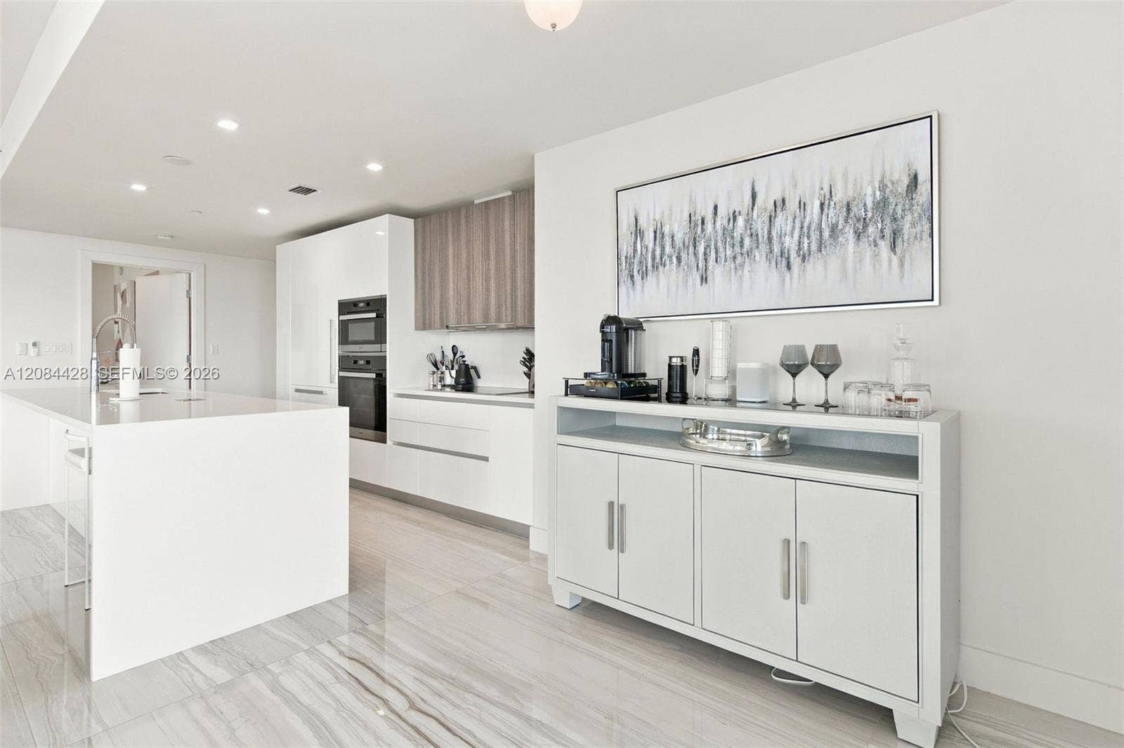 730 N Ocean Boulevard, #601, Pompano Beach, Pompano Beach, FL 33062 Modern kitchen with sleek cabinetry and built-in appliances.