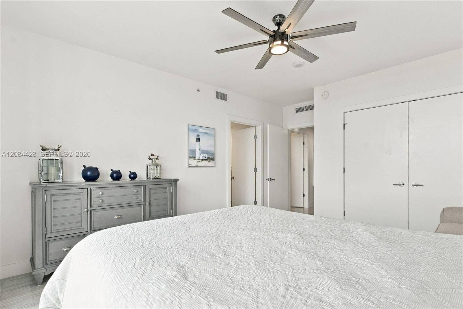 730 N Ocean Boulevard, #601, Pompano Beach, Pompano Beach, FL 33062 Additional view of the fully furnished guest bedroom. Guest bedroom includes a substantial custom-organized closet.