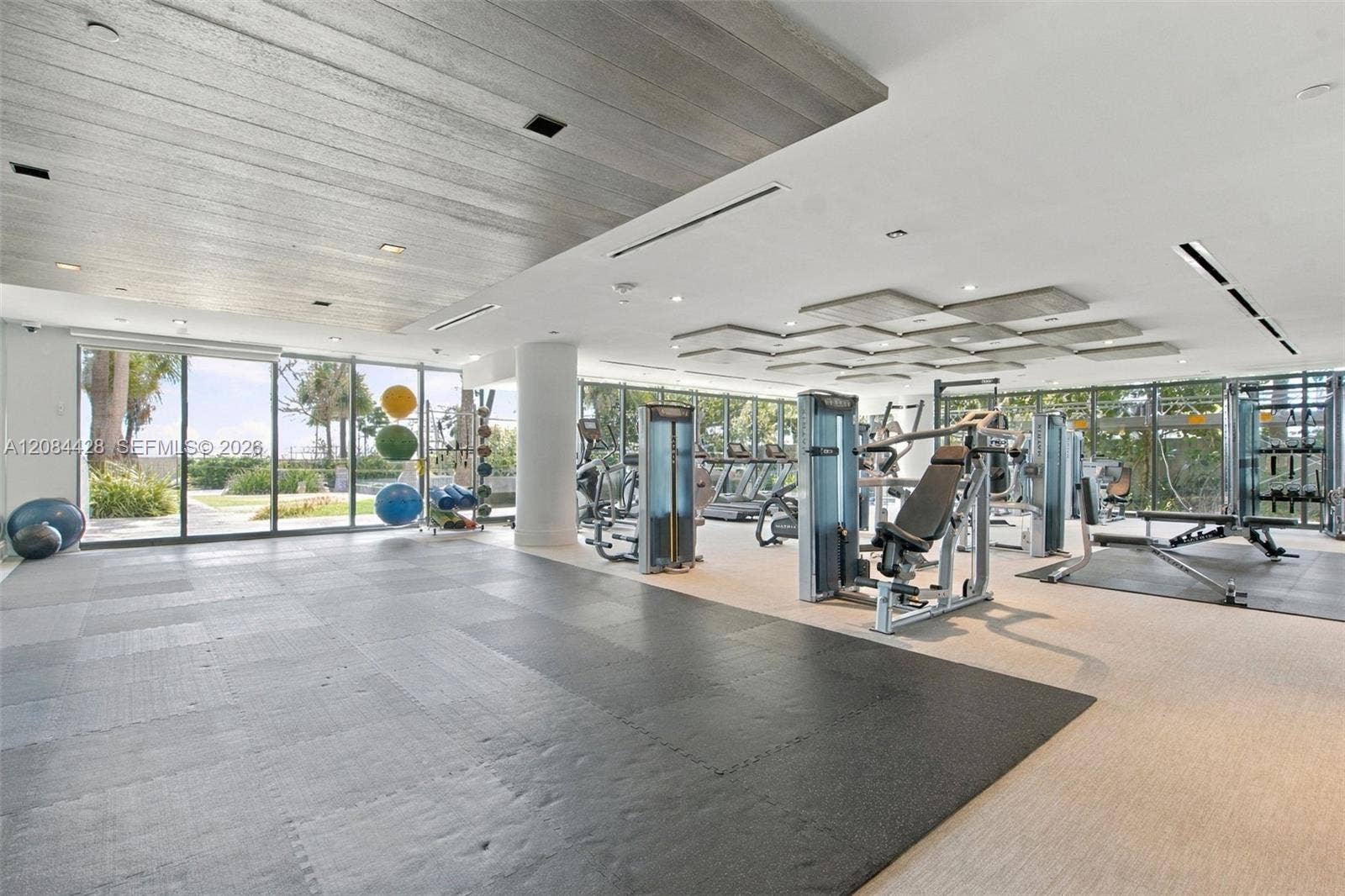730 N Ocean Boulevard, #601, Pompano Beach, Pompano Beach, FL 33062 Spacious light-filled fitness center with modern exercise equipment.