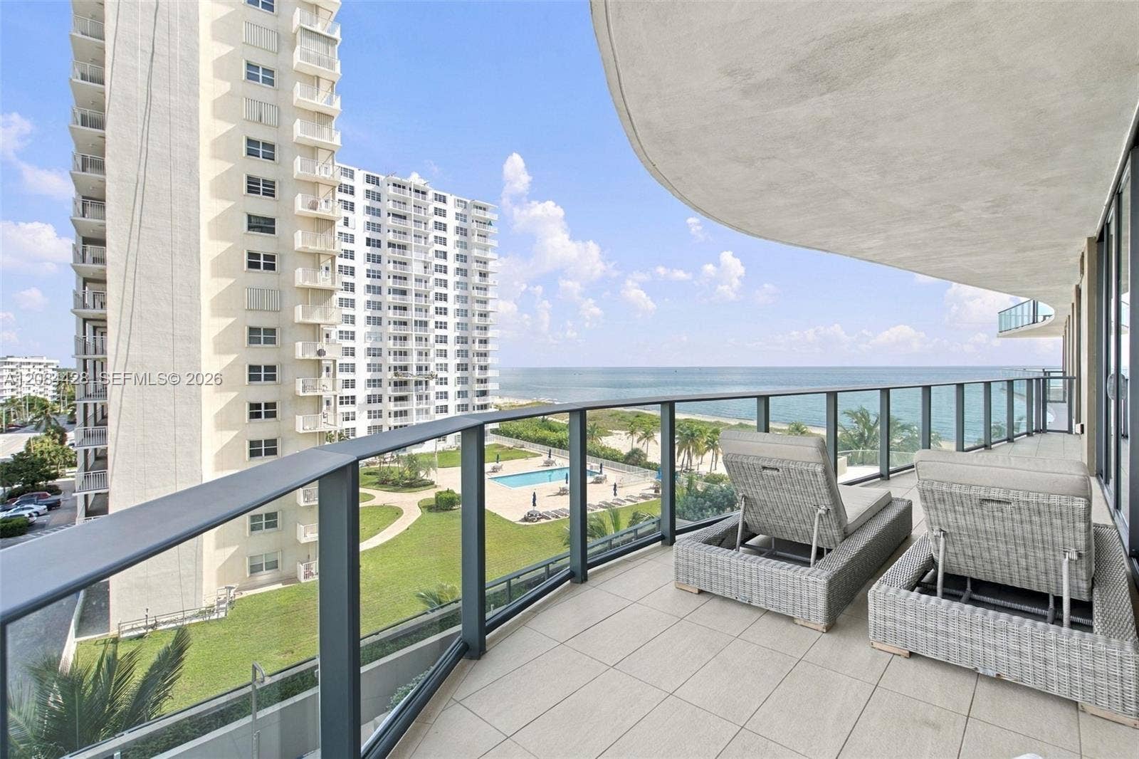730 N Ocean Boulevard, #601, Pompano Beach, Pompano Beach, FL 33062 Private balcony with comfortable seating and beautiful panoramic views.