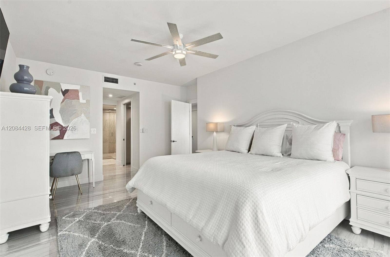 730 N Ocean Boulevard, #601, Pompano Beach, Pompano Beach, FL 33062 Fully furnished primary suite with a king-size bed.