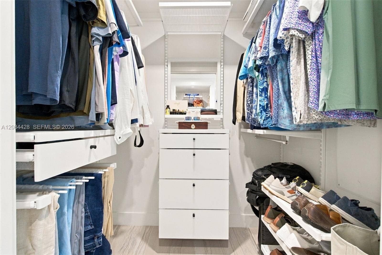 730 N Ocean Boulevard, #601, Pompano Beach, Pompano Beach, FL 33062 First of two separate custom-fitted walk-in closets with built-in drawers and hanging storage. Closets will be cleared for tenant use.