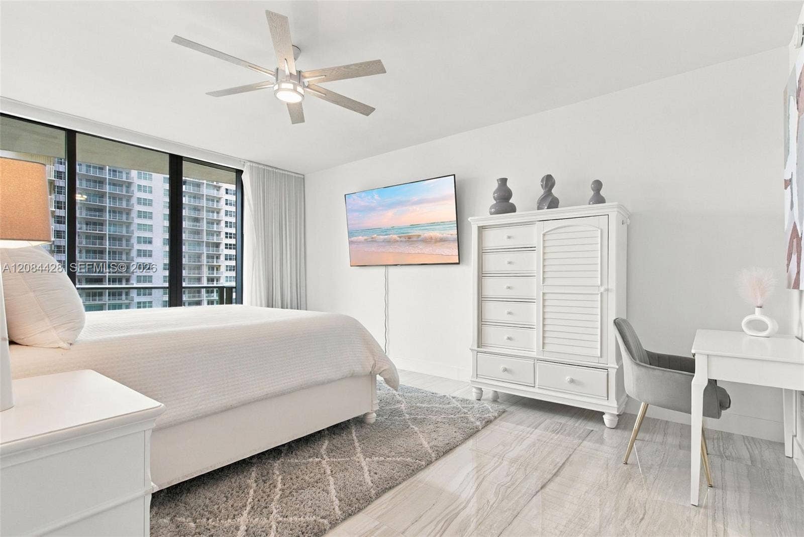 730 N Ocean Boulevard, #601, Pompano Beach, Pompano Beach, FL 33062 Spacious primary bedroom with an additional sitting or workspace area.