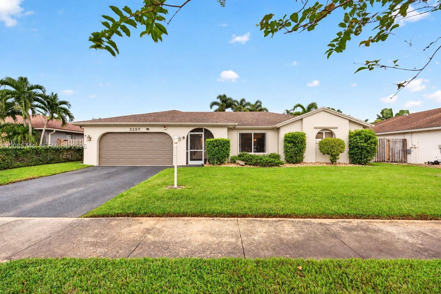Virtual Photo - house is a shade warmer than this. We also removed two trees in front of the house so you can see the front more. There is a lovely screened porch at the front.