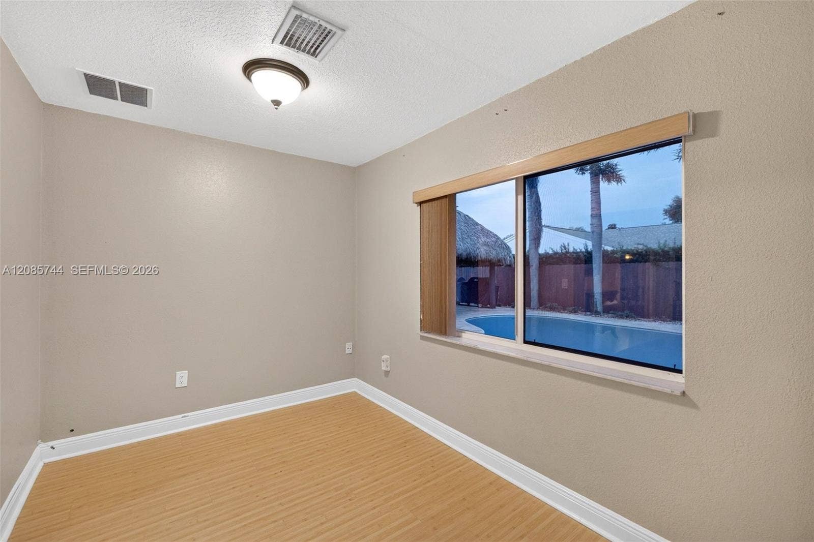 Office / Flex Space / Nursery / Gym / Addition off primary bedroom w/ laminate flooring