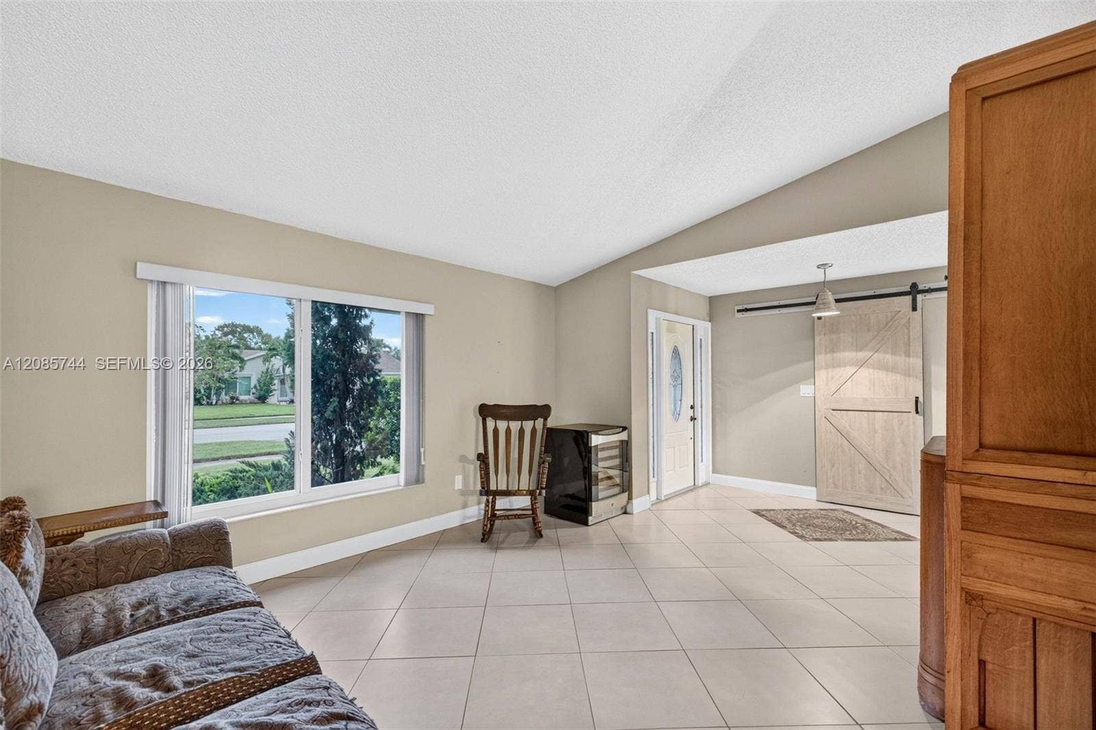 Formal living room overlooks front of house
